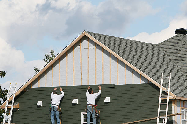 Professional Vinyl Siding technician working in Kittrell, NC